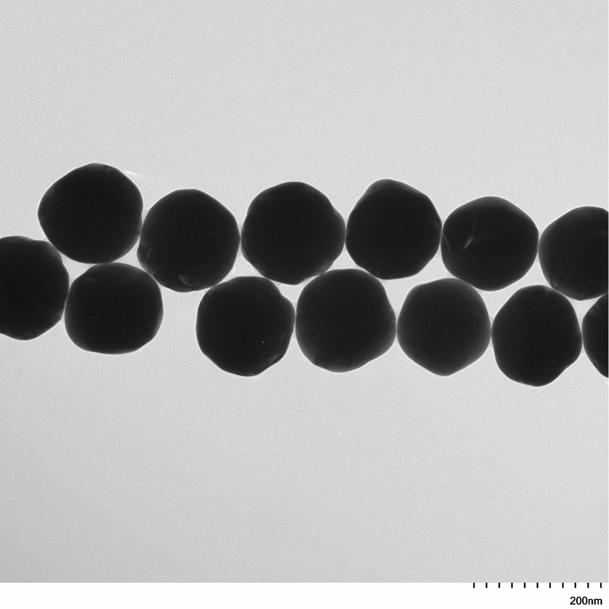 High magnification TEM image highlighting the smooth, spherical morphology of individual 150 nm gold nanoparticles